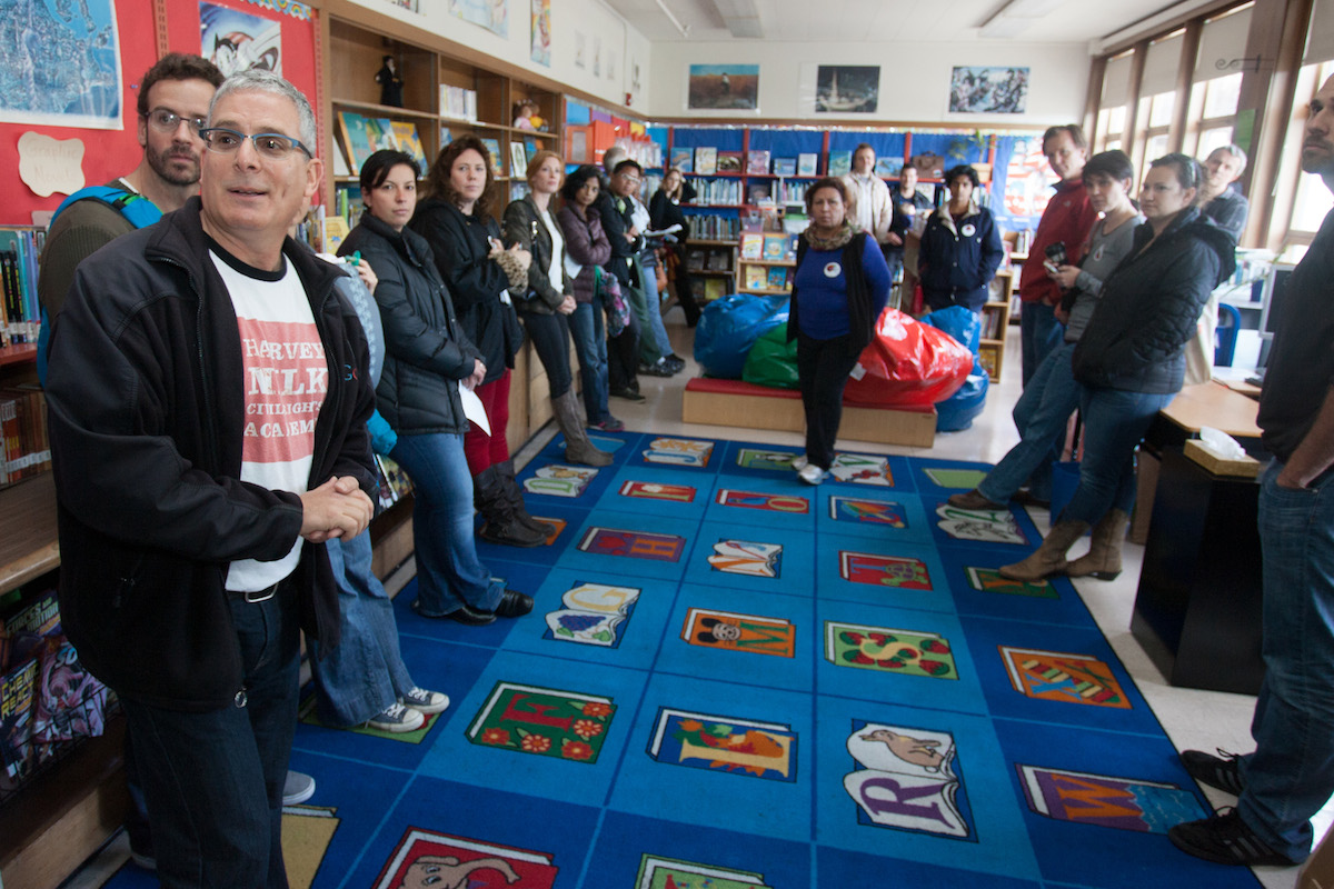 Schmell shows off the school library to a group of parents who are considering sending their children to Harvey Milk Civil Rights Academy. By giving tours and organizing frequent “fun raisers,” Schmell is working to revitalize a school that has struggled around issues of funding equity, race and social class, as well as management. A nonprofit organization, Friends of Harvey Milk, was one of the top fundraisers in the city, spending $380,000 a year, almost exclusively on before-school and after-school enrichment programs. But that collapsed in 2011 after key supporters withdrew, leaving the school with little fundraising infrastructure. “If we had everyone at Harvey Milk give $250 for the year, then we wouldn’t have to do severe fundraising,” he said. “I’m very concerned about technology. I’d love for us to have a computer lab, and we need to do a targeted fundraising campaign for that.” Photo: Luke Thomas / San Francisco Public Press