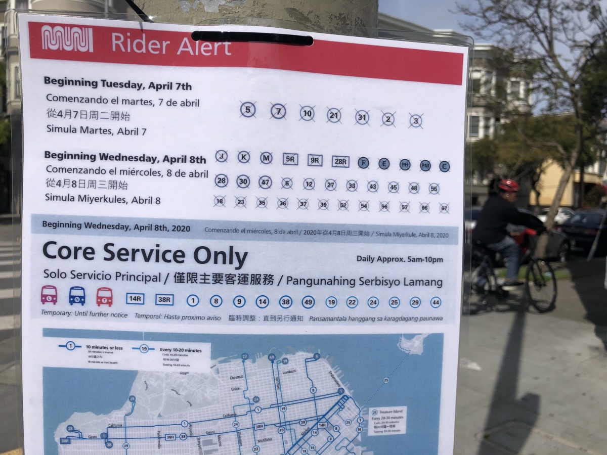 A Rider Alert sign listing dozens of cut bus routes along with a map showing the remaining core service routes was displayed at a temporarily decommissioned bus stop on April 8.