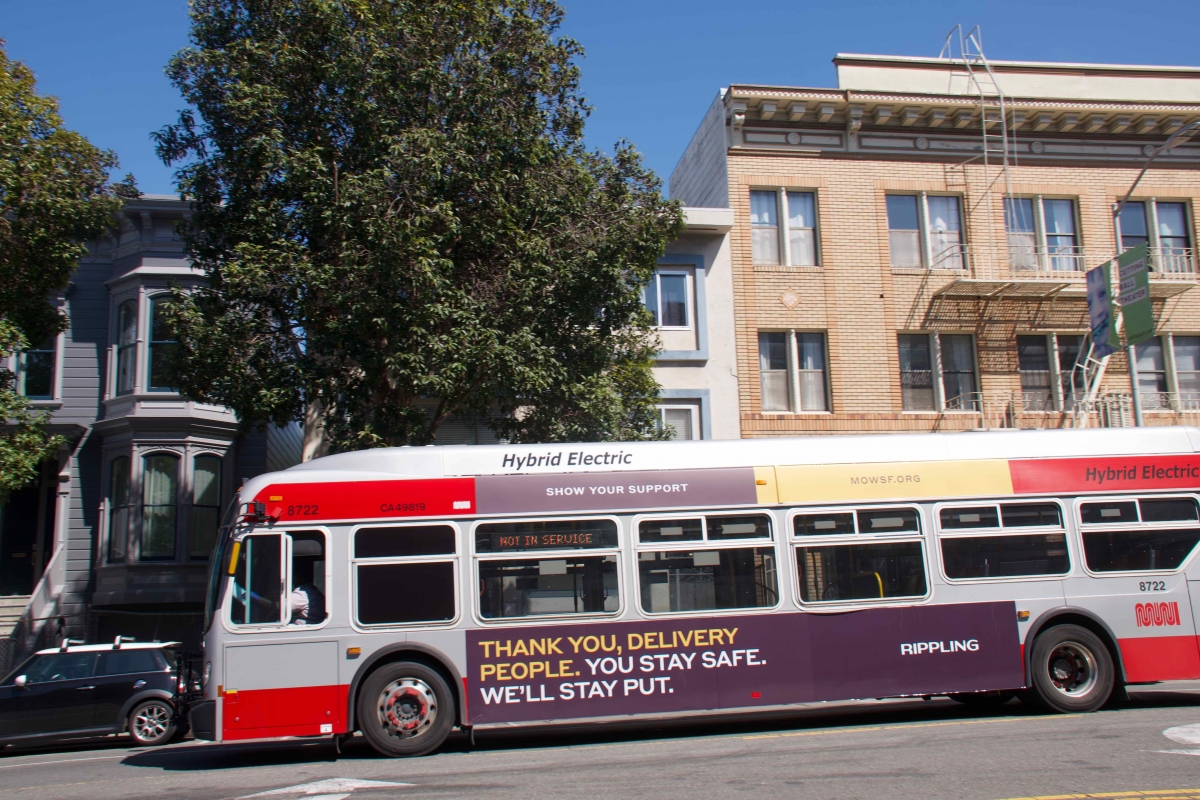 An ad supporting Meals on Wheels is displayed on an out-of-service bus on April 10.