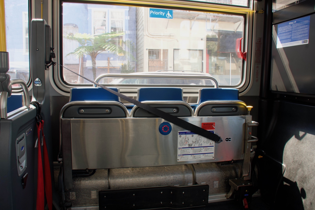 The front seats on the driver’s side of a Muni bus are strapped in upright position to keep riders farther from the driver on April 7.