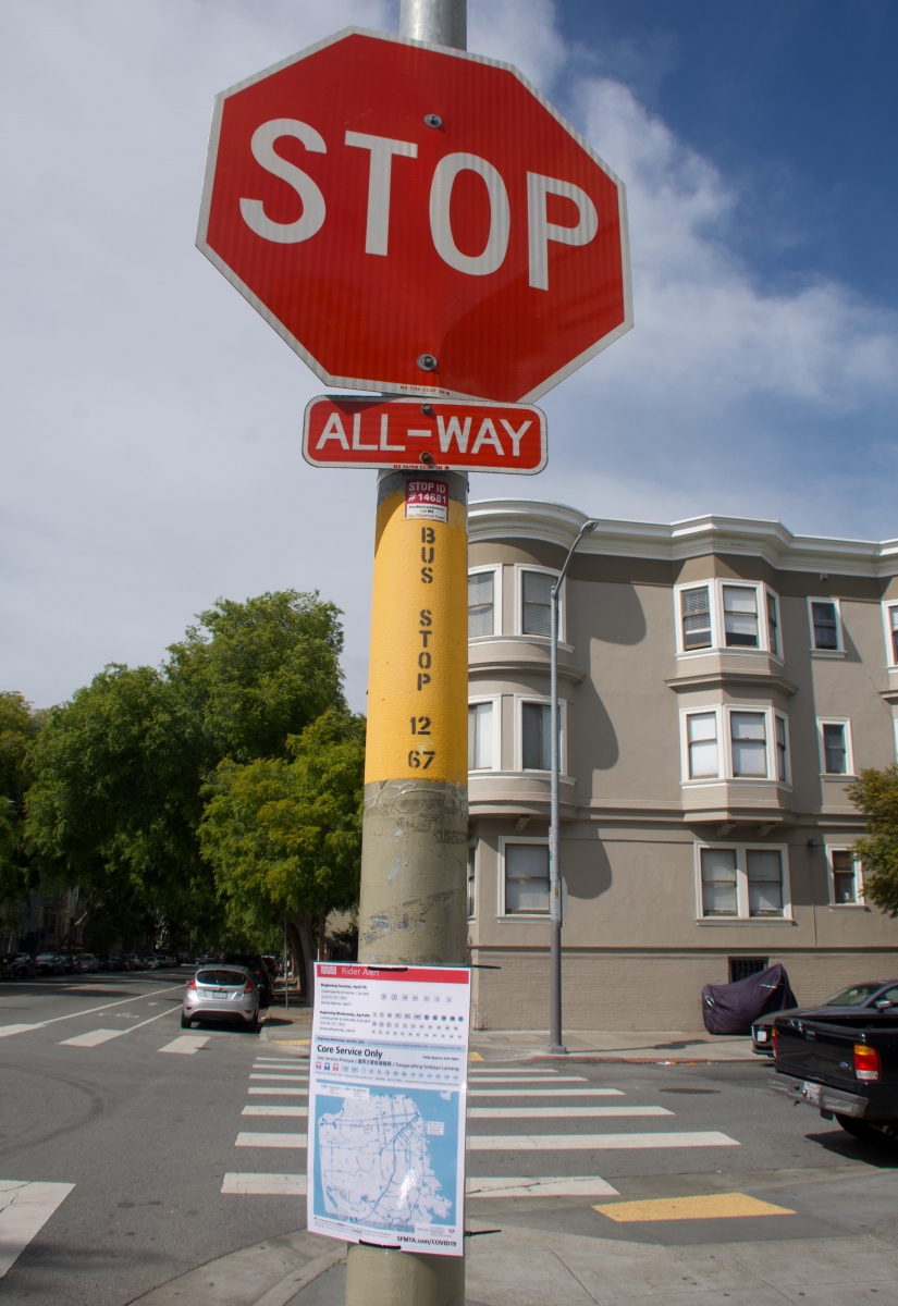 A sign explaining which bus routes had been cut and a map of remaining routes is posted at a bus stop that no longer has service from two routes on April 8. Muni workers volunteered to put up 2,000 signs at Muni stops throughout the city the night before.