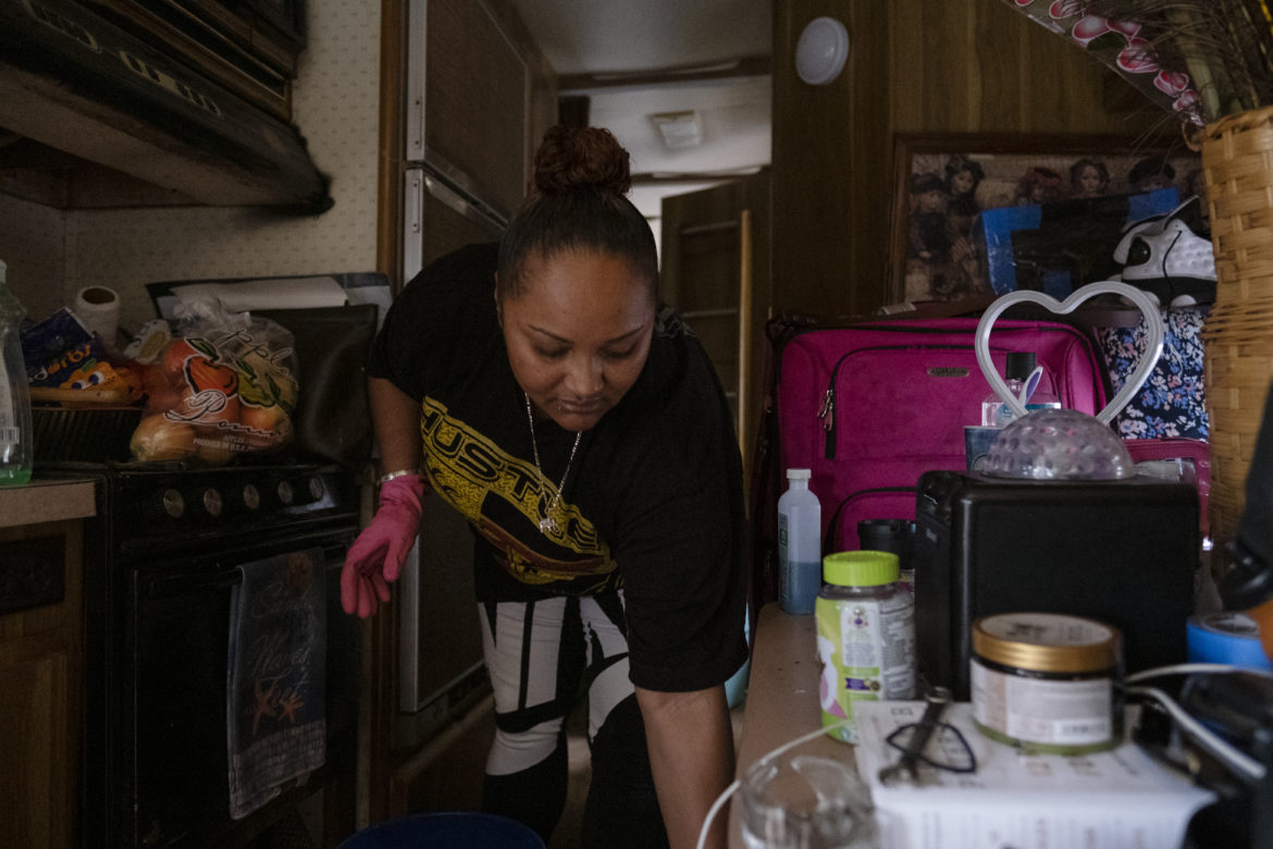 On this morning, Tolbert prepares a bucket of water to scrubs the shower inside her recreational vehicle. She takes care of her home and is grateful to have a place to call her own. “In Las Vegas, there’s people living in tunnels,” she said. “Our little RV is a mansion. We are living like kings and queens compared to them over there.”