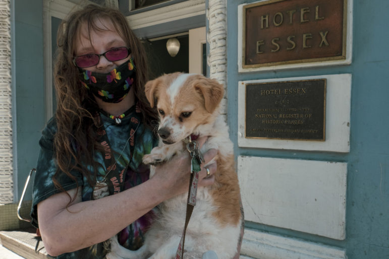 Kristi Banks, 51, lives with her companion dog Jack, aka “Carjack,” at the Hotel Essex at Ellis and Larkin streets. The single-room-occupancy hotel has been their home for 10 and a half years. Banks and Jack are inseparable. The dog gives her a sense of purpose and a schedule in her life, Banks said.