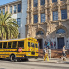 A school bus parked in front of Mission High School in San Francisco.