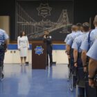 Mayor London Breed and Police Chief Bill Scott address cadets at the police academy.