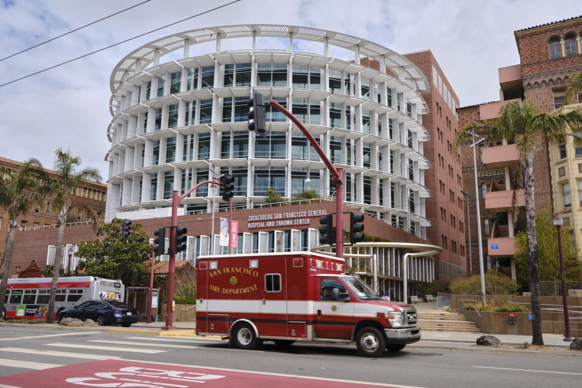 An ambulance passes in front of the Zuckerberg San Francisco General Hospital and Trauma Center.